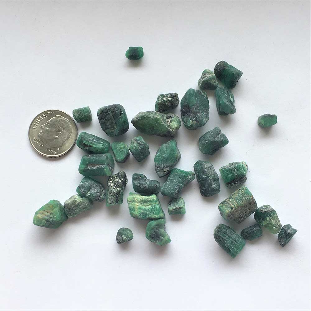 Emerald Crystals 33 Pieces Brazil 1980's, 24.3gm total wt., 6x5x5mm to 17x10x7mm in size, May Birthstone